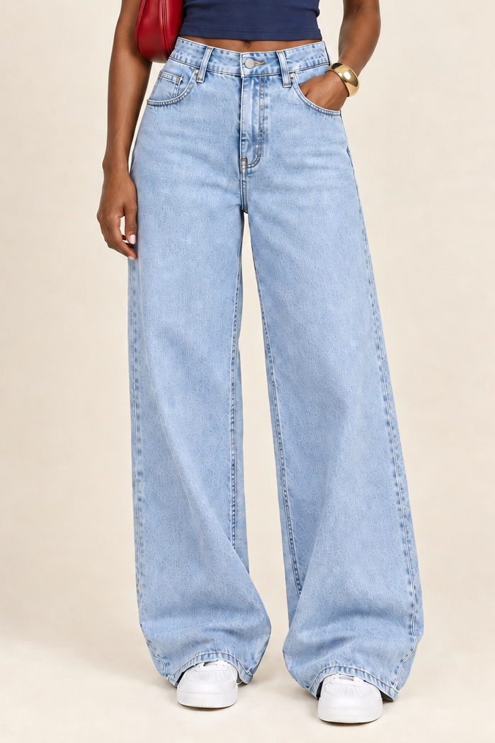 Black American model in navy baby tee and plain light-wash jeans