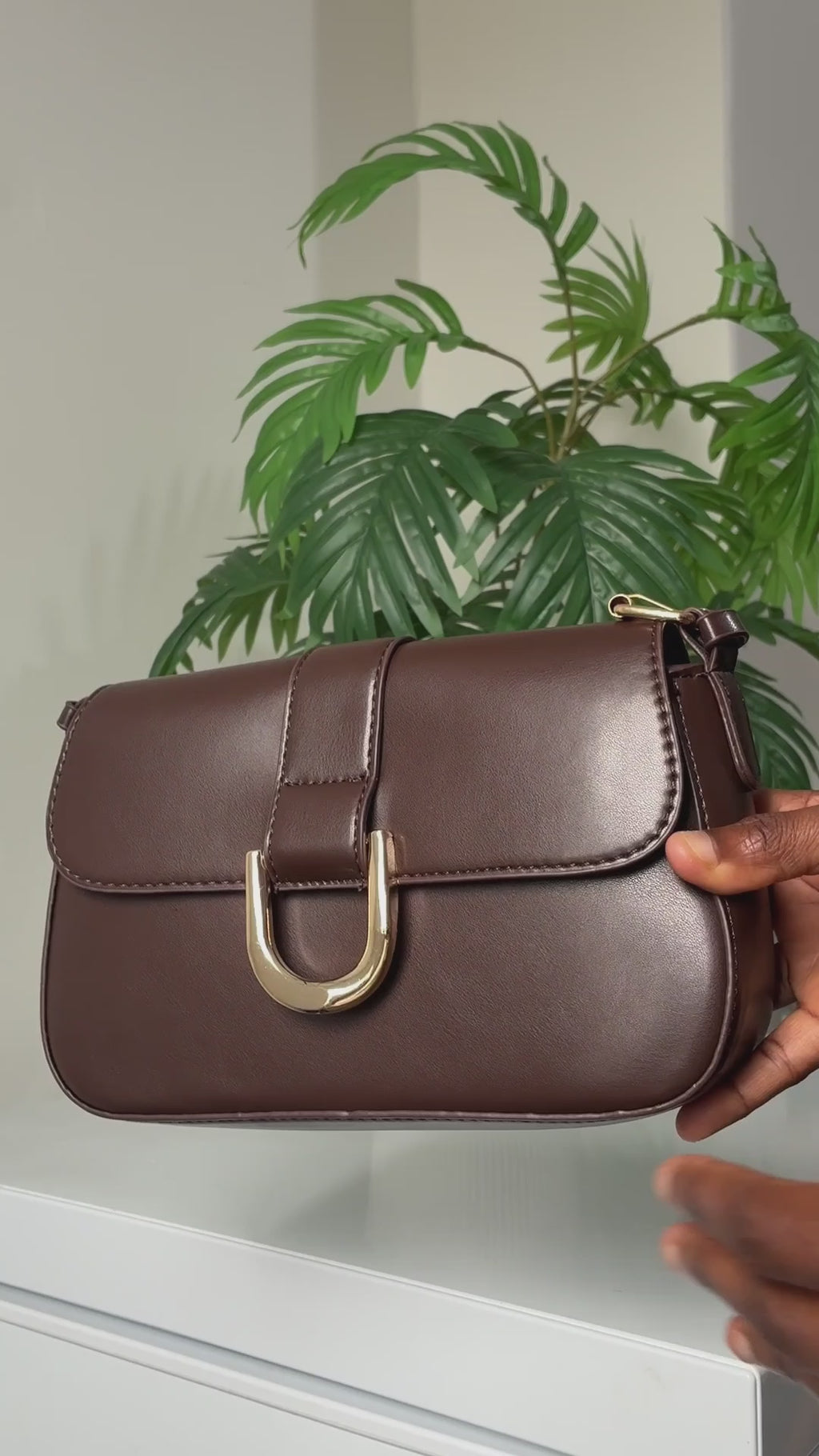 Brown buckle detail strap shoulder bag
