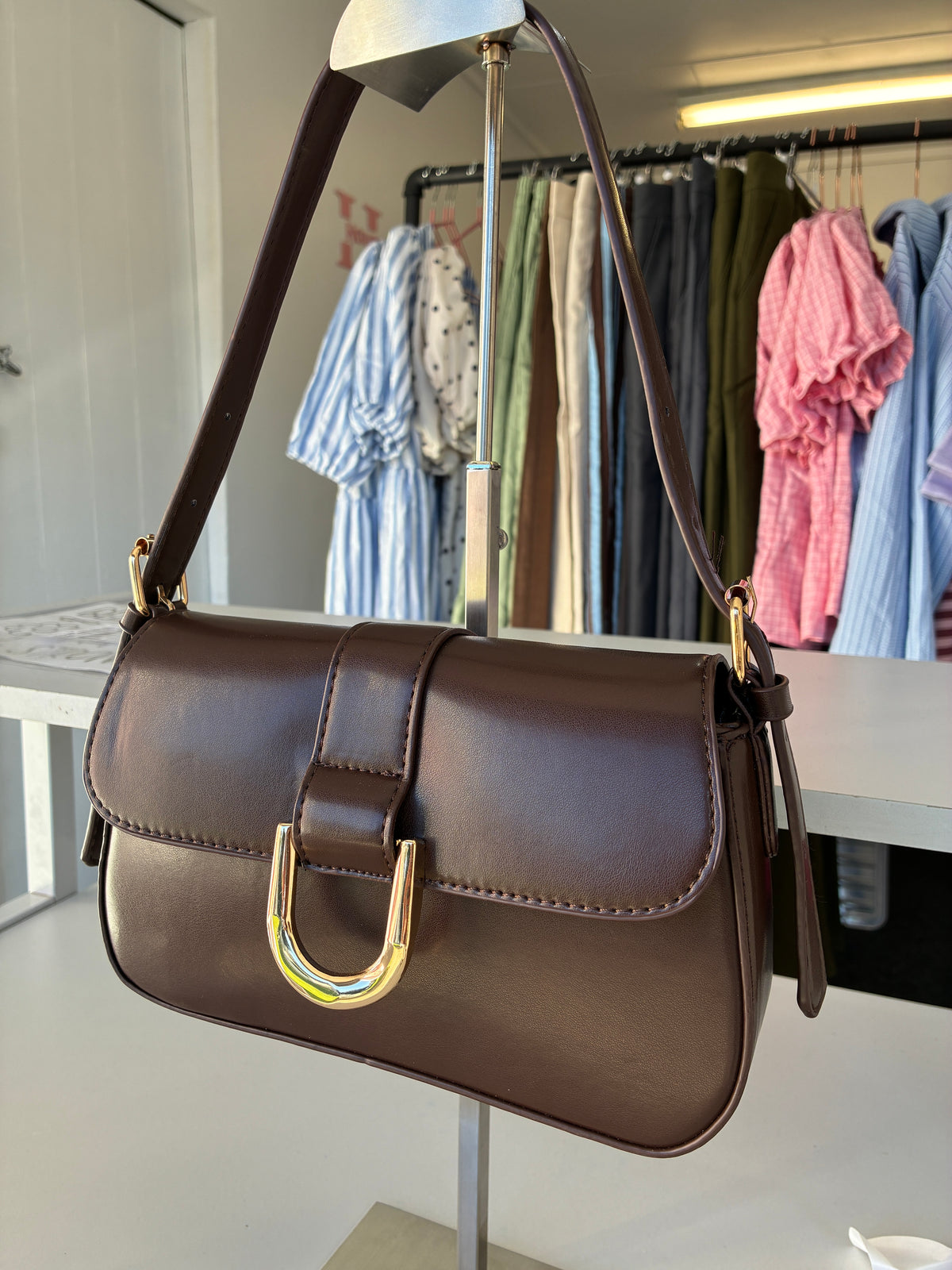 Brown buckle detail strap shoulder bag