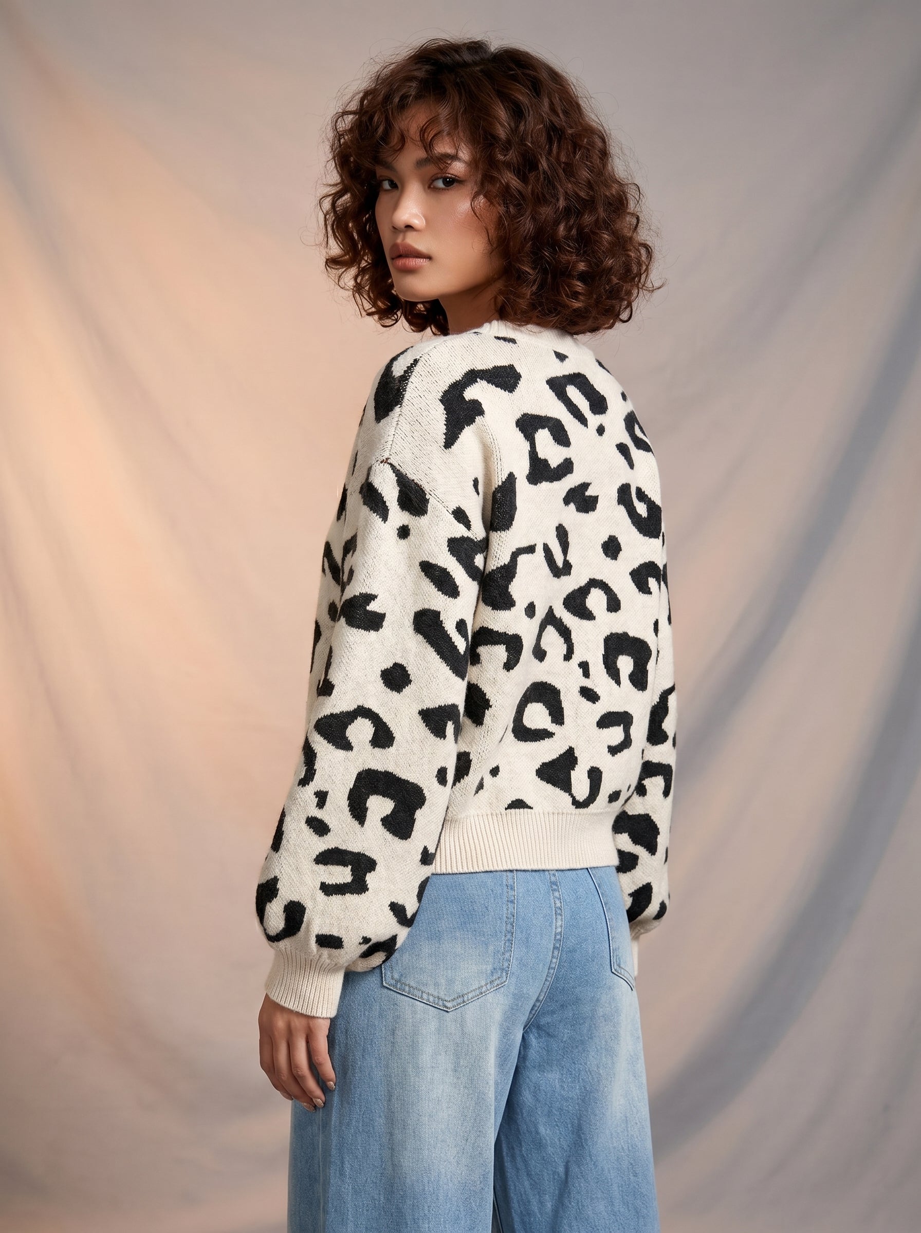 Leopard print bell sleeve sweater