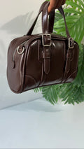 Buckle strap detail brown bag