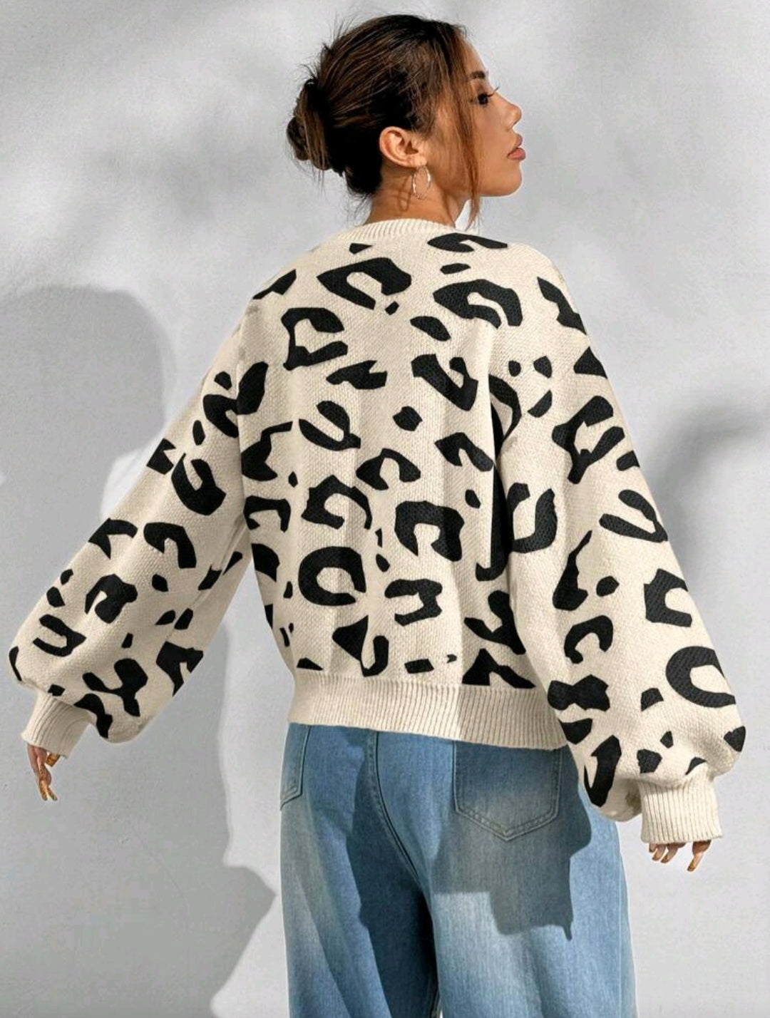Leopard print bell sleeve sweater