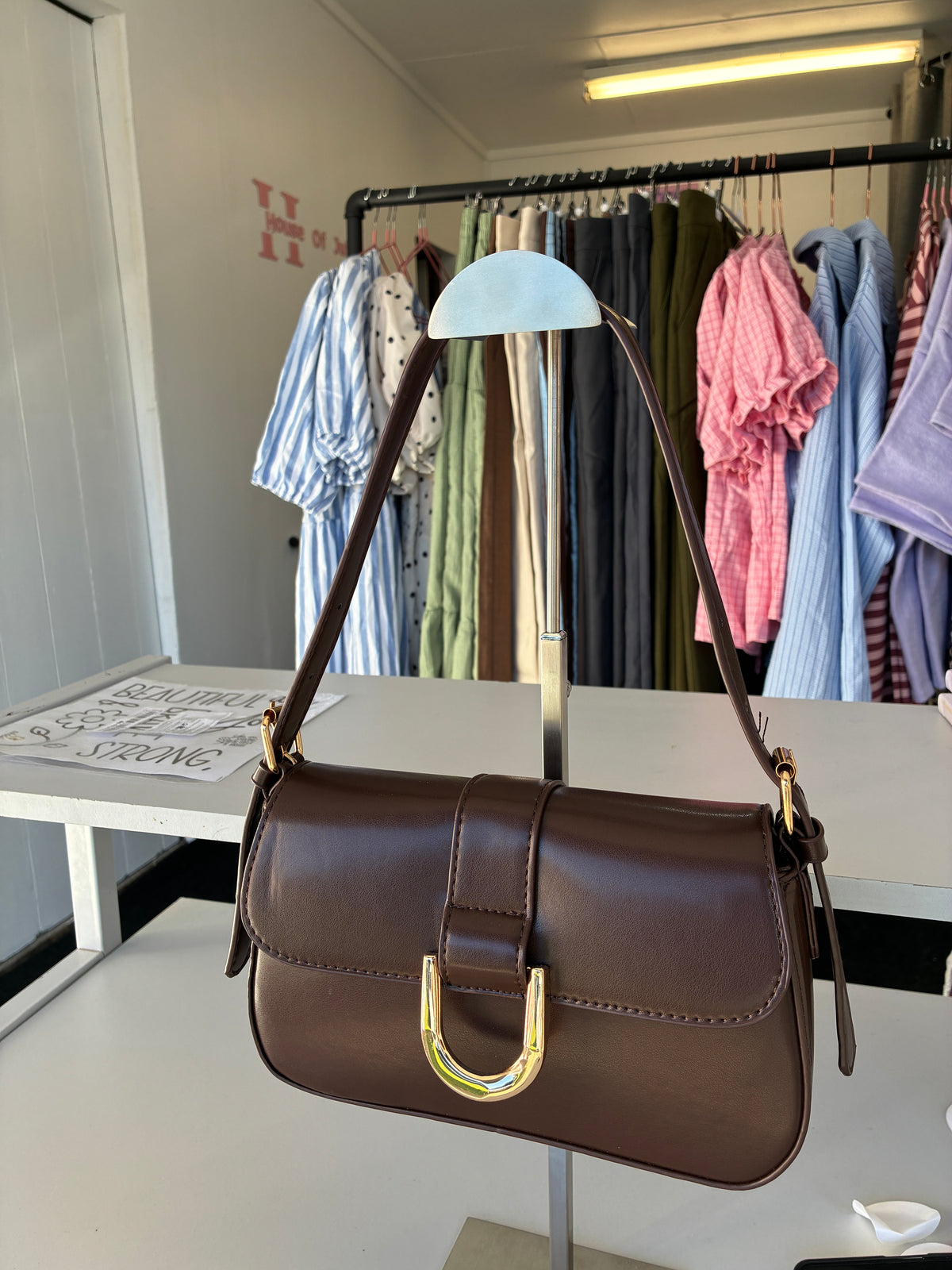 Brown buckle detail strap shoulder bag